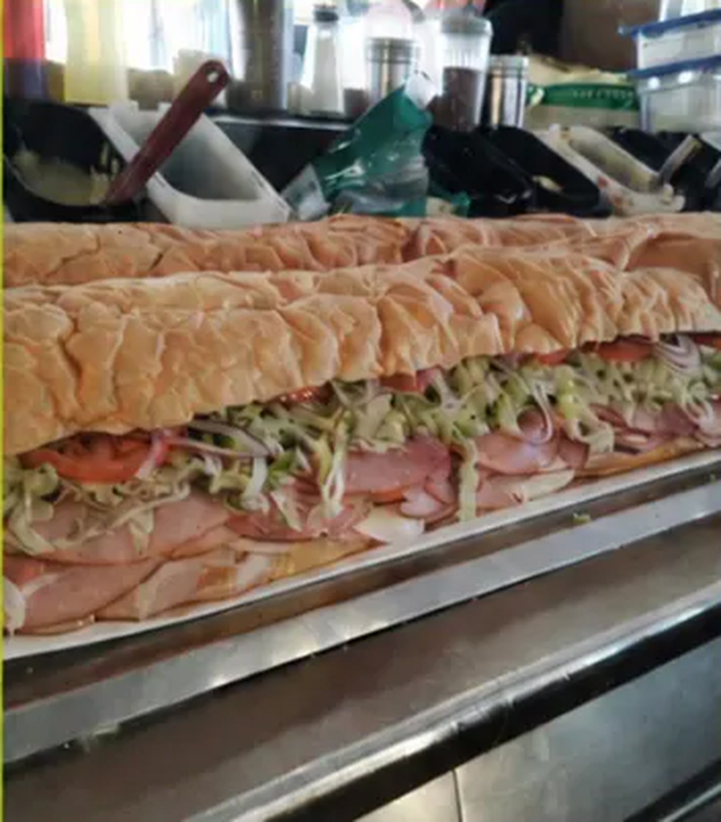 A finished Dino's party sub prepared on the sandwich line